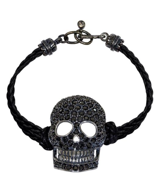 Pulsera calavera negra de plata y cuero trenzado