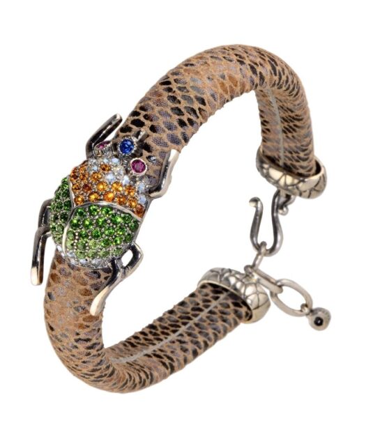 Pulsera Escarabajo de plata y cristales de Swarovski en diversos tonos fabricada en piel de serpiente de la colección de Máximo Betro. Joyería Turón, tienda online.