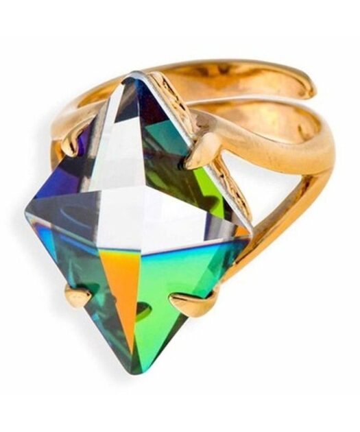 Anillo ciclón de plata bañada en oro con un cristal Swarovski azul facetado. Hecho en España de manera artesanal.