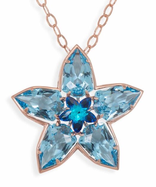 Colgante con forma de estrella azul de plata de ley con un baño de oro rosa.