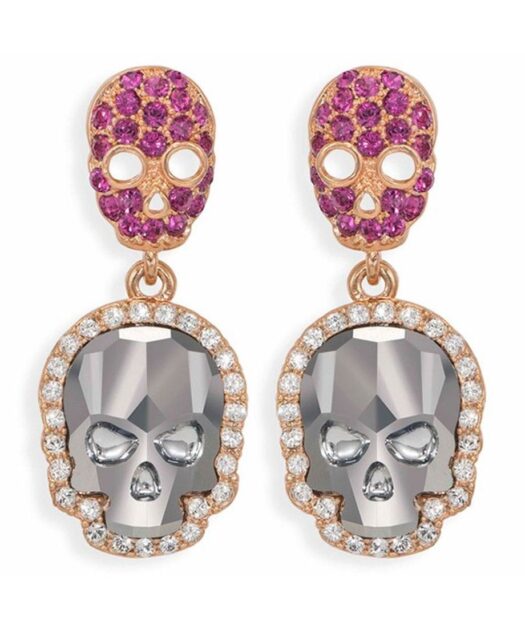 Pendientes articulados de calaveras fucsias y grises de plata de primera le con un baño de oro.