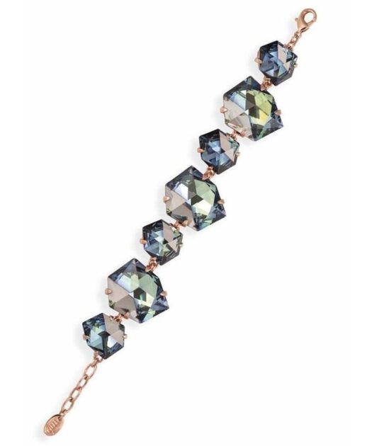 Pulsera ciclón de plata bañada en oro rosa con cristales Swarovski de color azul.