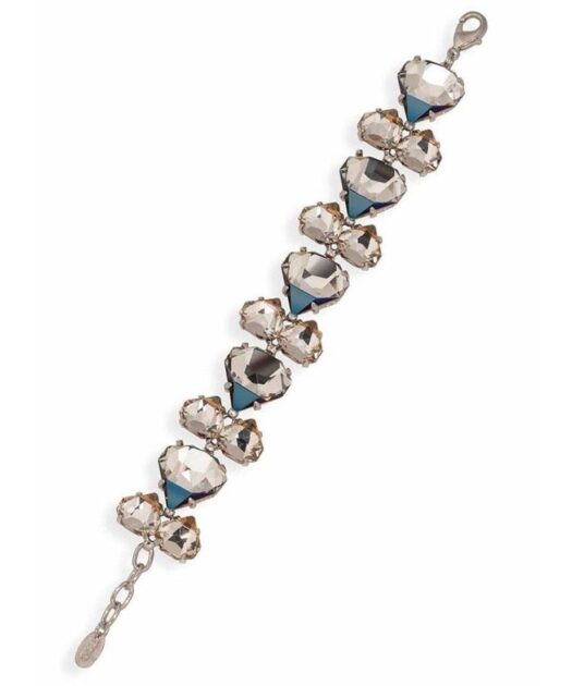 Pulsera ciclón de plata con cristales Swarovski grises y fumé. Cierre de mosquetón.